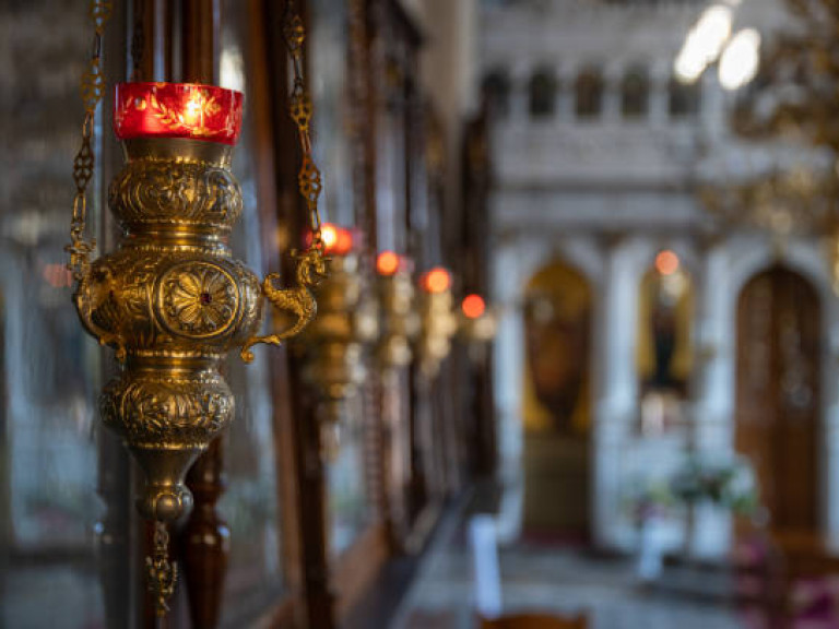 This is a photo of an elaborate oil lamp in a Greek Orthodox church